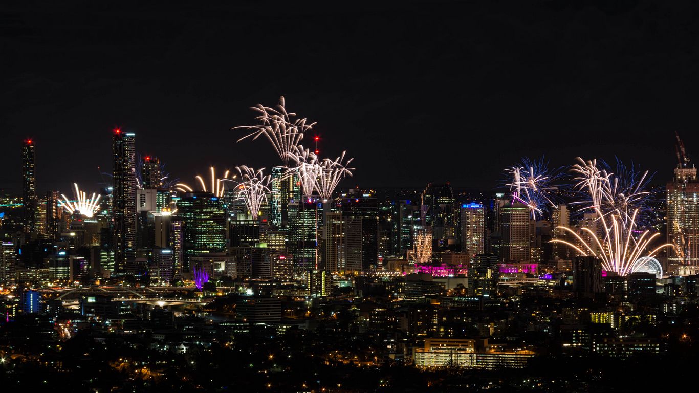 Download wallpaper 1366x768 fireworks, buildings, lights, night, city ...