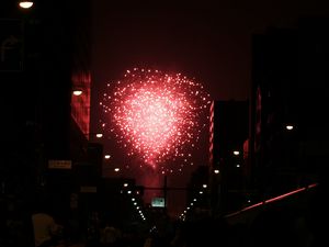 Preview wallpaper fireworks, pink, street, buildings, dark