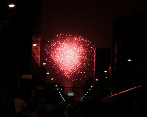 Preview wallpaper fireworks, pink, street, buildings, dark