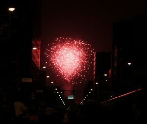 Preview wallpaper fireworks, pink, street, buildings, dark