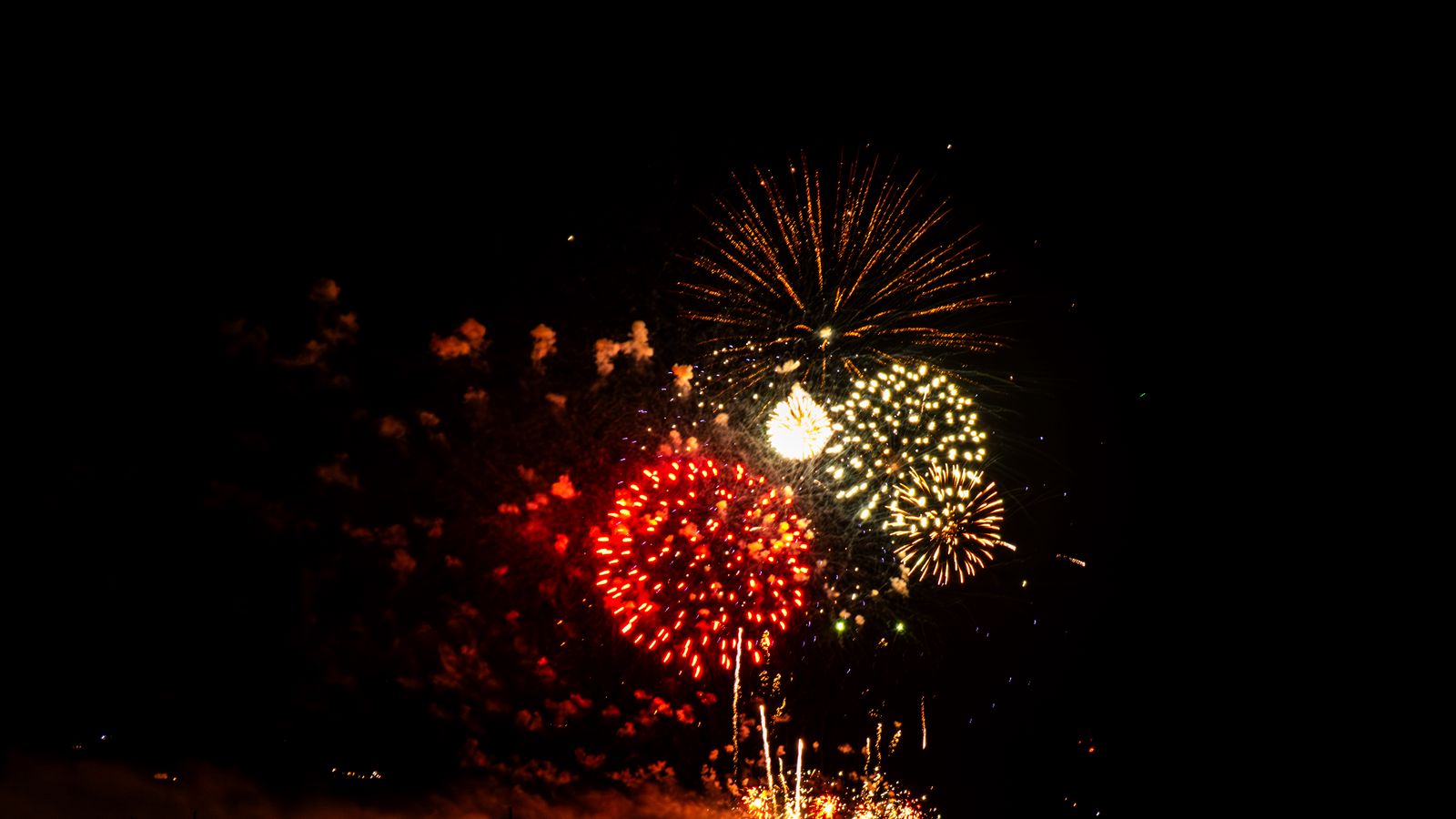 1600x900 Wallpaper fireworks, salutes, lights, glow, holiday, night, dark
