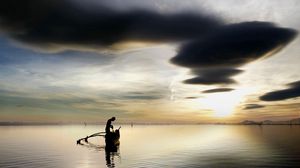 Preview wallpaper fisherman, lake, clouds, sky, boat