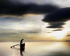 Preview wallpaper fisherman, lake, clouds, sky, boat