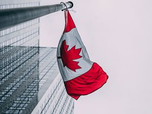 Preview wallpaper flag, canada, buildings, skyscrapers, flagpole