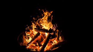 Preview wallpaper flame, bonfire, fire, sparks, dark