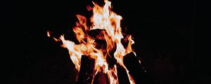 Preview wallpaper flame, bonfire, sparks, fire, black, dark