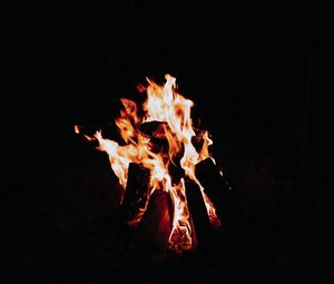 Preview wallpaper flame, bonfire, sparks, fire, black, dark
