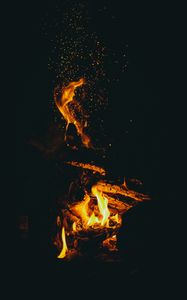 Preview wallpaper flame, sparks, dark, bonfire