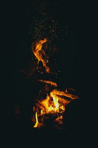 Preview wallpaper flame, sparks, dark, bonfire