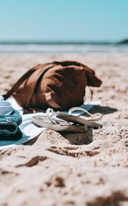 Preview wallpaper flip-flops, briefcase, beach, sand