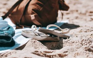 Preview wallpaper flip-flops, briefcase, beach, sand