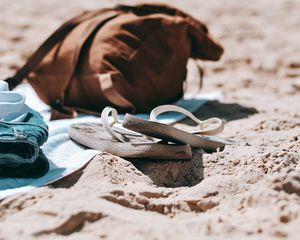 Preview wallpaper flip-flops, briefcase, beach, sand