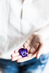 Preview wallpaper flower, hand, palm, purple, fingers