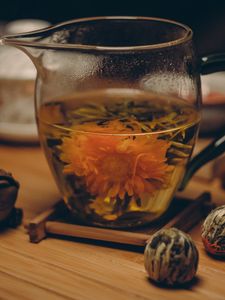 Preview wallpaper flowering tea, bud, cup, tea party