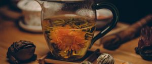 Preview wallpaper flowering tea, bud, cup, tea party