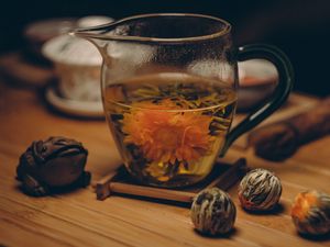 Preview wallpaper flowering tea, bud, cup, tea party