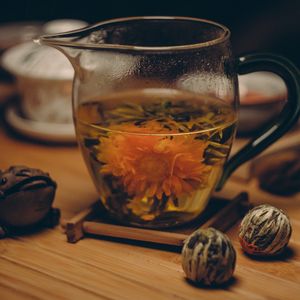 Preview wallpaper flowering tea, bud, cup, tea party