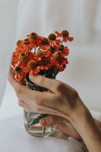 Preview wallpaper flowers, bouquet, hand, fingers, cloth