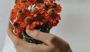 Preview wallpaper flowers, bouquet, hand, fingers, cloth