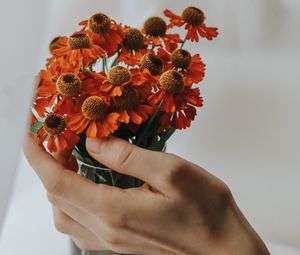 Preview wallpaper flowers, bouquet, hand, fingers, cloth