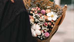 Preview wallpaper flowers, bouquet, newspaper, girl