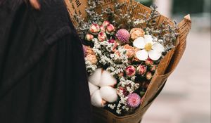 Preview wallpaper flowers, bouquet, newspaper, girl