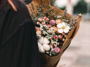 Preview wallpaper flowers, bouquet, newspaper, girl