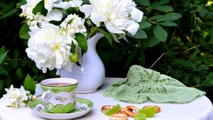 Preview wallpaper flowers, cup, pretzels, still life