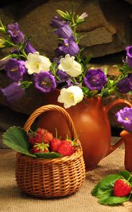 Preview wallpaper flowers, jugs, strawberry, basket, stone, table