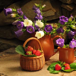 Preview wallpaper flowers, jugs, strawberry, basket, stone, table