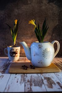 Preview wallpaper flowers, yellow, kettle, mug, table