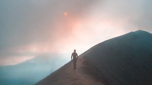 Preview wallpaper fog, mountain, man, loneliness, peak, solitude, sky