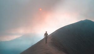 Preview wallpaper fog, mountain, man, loneliness, peak, solitude, sky