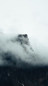 Preview wallpaper fog, mountains, peak, rock