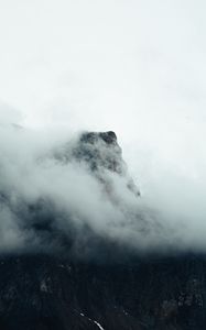 Preview wallpaper fog, mountains, peak, rock