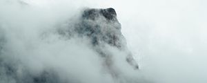 Preview wallpaper fog, mountains, peak, rock