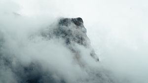 Preview wallpaper fog, mountains, peak, rock
