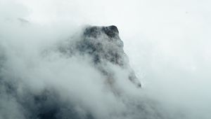 Preview wallpaper fog, mountains, peak, rock