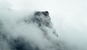 Preview wallpaper fog, mountains, peak, rock