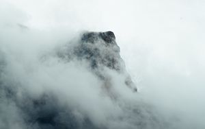 Preview wallpaper fog, mountains, peak, rock