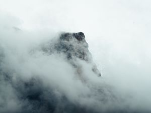 Preview wallpaper fog, mountains, peak, rock
