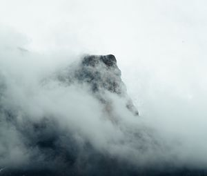 Preview wallpaper fog, mountains, peak, rock