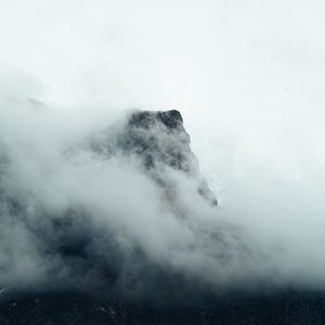 Preview wallpaper fog, mountains, peak, rock