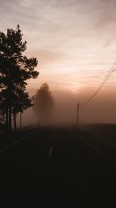 Preview wallpaper fog, road, trees, twilight, sky