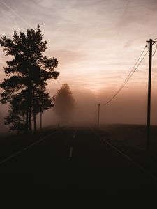 Preview wallpaper fog, road, trees, twilight, sky