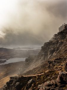 Preview wallpaper fog, rock, cliff, stone