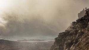 Preview wallpaper fog, rock, cliff, stone