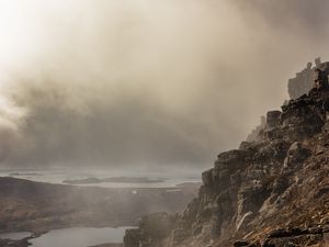 Preview wallpaper fog, rock, cliff, stone