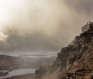 Preview wallpaper fog, rock, cliff, stone