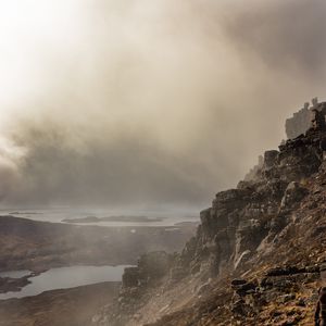 Preview wallpaper fog, rock, cliff, stone
